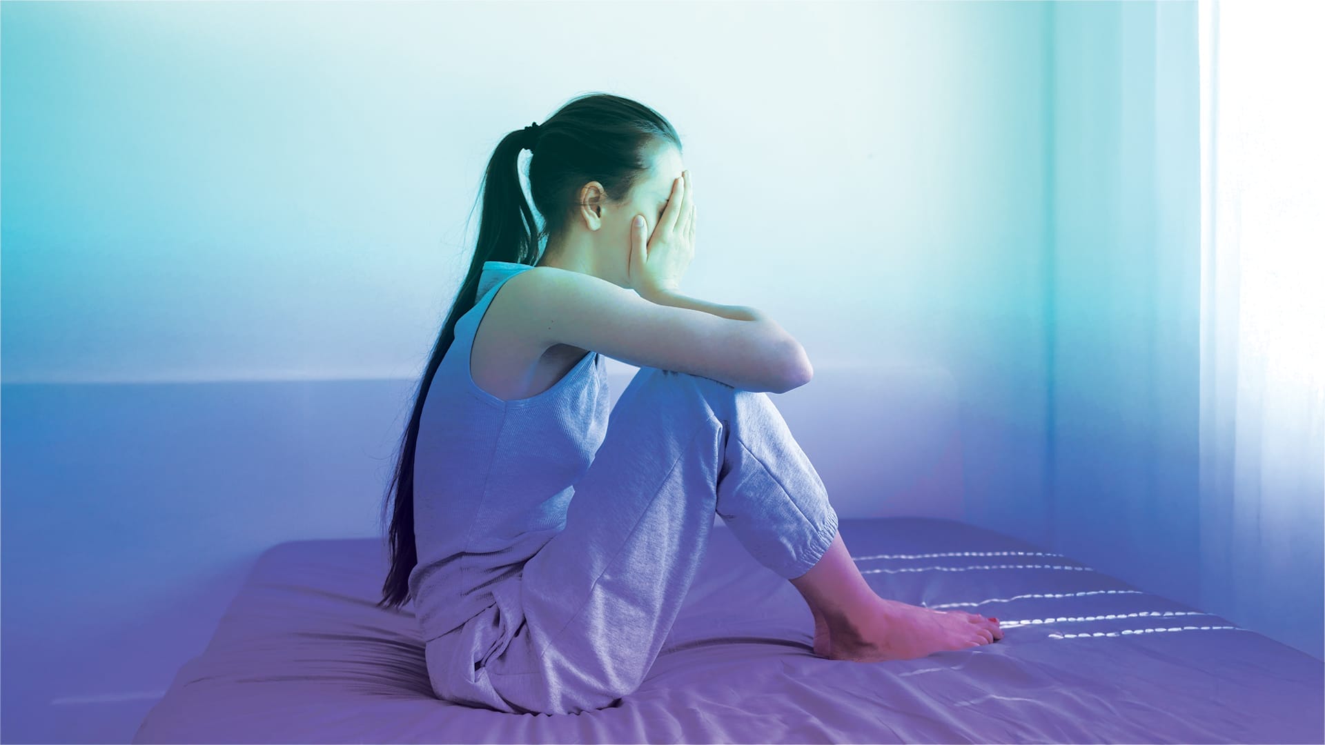 A person sitting peacefully in a wellness clinic after receiving ketamine therapy for treatment-resistant depression in Bonita Springs